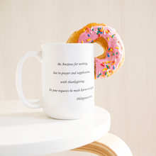 Load image into Gallery viewer, Be_Anxious_For_Nothing_15ozWhiteMugLifetsyleDonutLH_Mockup.png