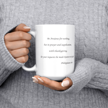 Load image into Gallery viewer, Be_Anxious_For_Nothing_15ozWhiteMugLifestyleLHChest_Mockup.png
