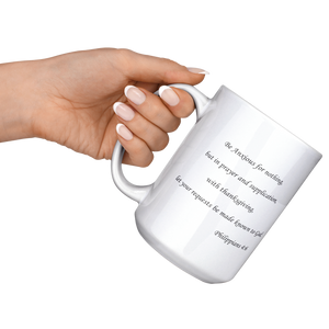 Be_Anxious_For_Nothing_15ozWhiteMugLifestyleLHRaisedAngle_Mockup.png