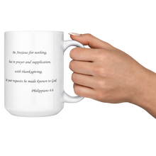 Load image into Gallery viewer, Be_Anxious_For_Nothing_15ozWhiteMugLifestyleRHCheers_Mockup.png
